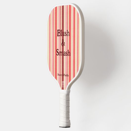 en roze pickleball paddle (Links)