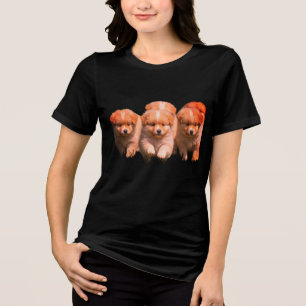 En Tri-matière Chiots trop mignons sur un T-shirt noir à manches