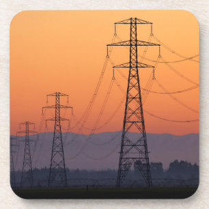Energiemasten bij zonsondergang bier onderzetter