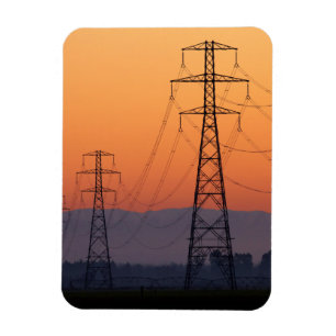 Energiemasten bij zonsondergang magneet
