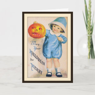Enfant avec carte de Jack O' Lantern d'Halloween