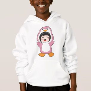Enfant avec costume de pingouin