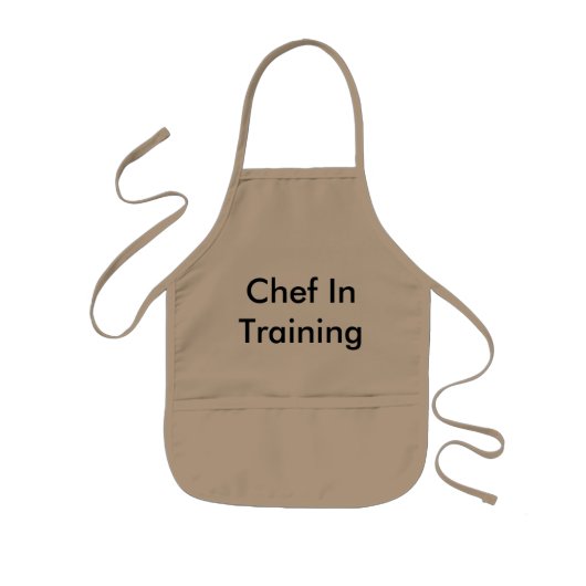 Enfant Chef dans le tablier des enfants de formation (Devant)