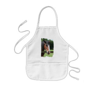 Enfant Image d'un tablier d'enfants de cheval de quart