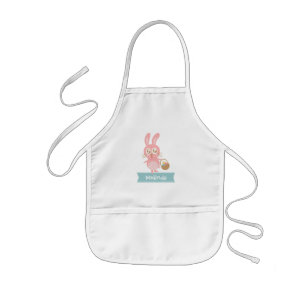 Enfant Lapin de Pâques mignon avec tablier d'œufs
