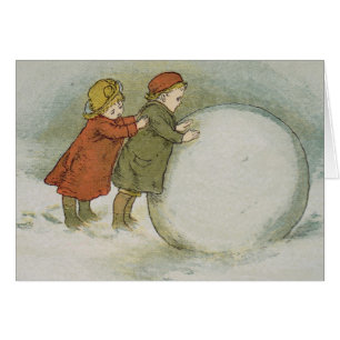 Enfants roulant des boules de neige