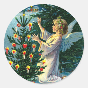 Engel decormeert kerstboom 2 ronde sticker