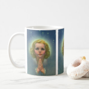 Engelachtig blond meisje met halo en sterren die b koffiemok
