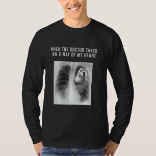 Engelse Setter Dog Doctor neemt een röntgenfoto va T-shirt