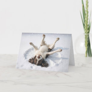 Engelse Springer Spaniel maakt een sneeuwengel Feestdagen Kaart