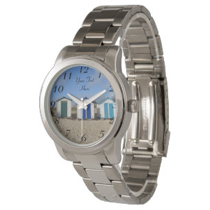engelse zee - blauwe skies en strandhutten horloge