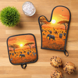 Ensemble De Gant De Cuisine Et De Manique Art du coucher de soleil sur la savane africaine