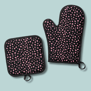 Ensemble De Gant De Cuisine Et De Manique Point rose abstrait sur fond noir