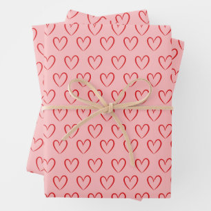 Ensemble de papier d'emballage à cœur rose