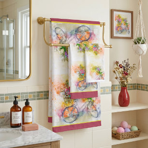 Ensemble serviette de bain vélo et fleurs