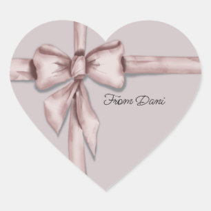 Enveloppé dans un autocollant étiquette arc rose