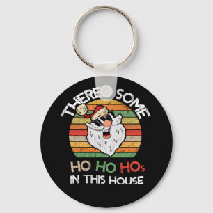 Er is een Ho Hos in deze Huis Retro Santa Sleutelhanger