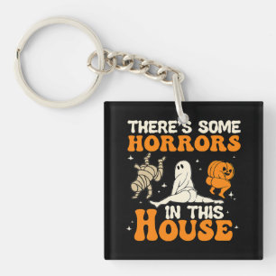 Er zijn enkele verschrikkingen in dit huis Funny H Sleutelhanger