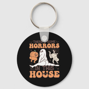 Er zijn enkele verschrikkingen in dit huis Hallowe Sleutelhanger