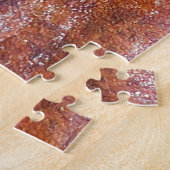 Escargot sur le puzzle de feuille (Côté)