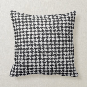 Et blanc coussin modelé par tweed noir