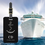 Étiquette À Bagage Ancre mer argent noir nom monogramme<br><div class="desc">Un arrière - plan noir classique. Décoré d'une fausse ancre argentée. Personnalisez et ajoutez vos initiales monographiques et votre nom complet sur le devant. Retour : ajoutez vos coordonnées.</div>