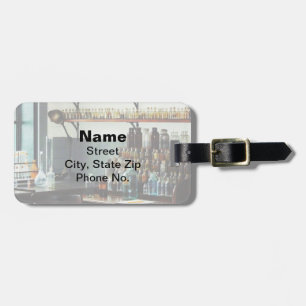 Étiquette À Bagage Bureau avec des bouteilles de produits chimiques