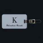 Étiquette À Bagage Dusty Blue Monograms Aventure Attend Don Faveur<br><div class="desc">Initiale monogrammée s avec texte personnalisé "Adventure Await" et aussi des détails personnels comme le nom,  l'adresse,  le numéro de téléphone et l'e-mail que vous pouvez modifier. Conçu avec un arrière - plan bleu poussiéreux populaire,  vous pouvez changer la couleur si vous le souhaitez.</div>