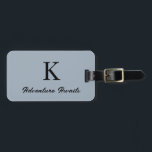 Étiquette À Bagage Dusty Blue Monograms Aventure Attend Don Faveur<br><div class="desc">Initiale monogrammée s avec texte personnalisé "Adventure Await" et aussi des détails personnels comme le nom,  l'adresse,  le numéro de téléphone et l'e-mail que vous pouvez modifier. Conçu avec un arrière - plan bleu poussiéreux populaire,  vous pouvez changer la couleur si vous le souhaitez.</div>