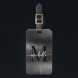Étiquette À Bagage Écriture initiale de monogramme or métal noir élég<br><div class="desc">Étiquette de bagage personnalisée élégante moderne et chic avec monogramme et nom en écriture manuscrite noire sur fond en métal personnalisable. Ce design présente un prénom dans une jolie calligraphie à empattements (ou typographie) avec monogramme initial et informations d'adresse sur un fond en faux métal noir. Celles-ci sont faciles à...</div>