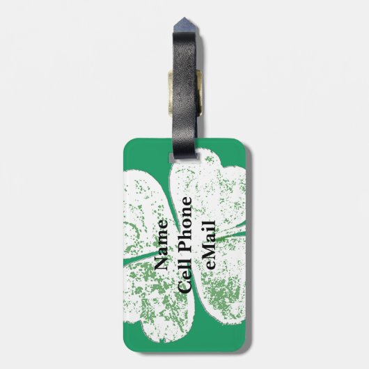 Étiquette À Bagage Housse à quatre feuilles blanche grungy sur sol ve (Dos Vertical)