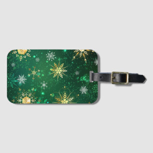 Étiquette À Bagage Les flocons dorés de Noël sur l'Arrière - plan ver