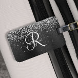 Étiquette À Bagage Monogramme à étincelle noire à Parties scintillant<br><div class="desc">Personnalisez facilement ce design élégant et branché de porte-bagages avec une jolie parties scintillant brillante en argent sur un arrière - plan métallique brossé noir.</div>