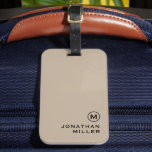 Étiquette À Bagage Monogramme beige minimaliste moderne<br><div class="desc">Le design moderne des étiquettes de bagage comprend un simple médaillon en monogramme beige avec votre initiale en monogramme et nom en typographie noire classique pour un look professionnel simple et élégant.</div>