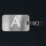 Étiquette À Bagage Monogramme en métal brossé argent Nom et initiale<br><div class="desc">Monogramme en argent brossé de luxe en métal brossé Nom et étiquette de bagages initiale. Cette étiquette de sac est parfaite pour le retour à l'école,  le travail ou le voyage.</div>