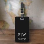 Étiquette À Bagage Monogramme moderne noir et blanc minimaliste<br><div class="desc">Améliorez votre expérience de voyage avec notre étiquette de bagages Monogramme minimaliste classique élégant et moderne. Cet accessoire méticuleusement conçu allie élégance intemporelle et minimalisme contemporain, assurant à vos bagages un caractère sophistiqué. Réalisée avec précision et attention au détail, cette étiquette à bagages est plus qu'un simple article pratique, c'est...</div>