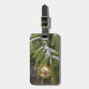 Étiquette À Bagage Ornement en verre de Noël d'or sur l'arbre à