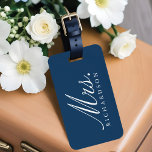 Étiquette À Bagage Paris Tour Eiffel Aquarelle Florale Mme Mariage<br><div class="desc">Notre mariage Paris Whisper Madame design de sac à bagages évoque une élégance française romantique et séduisante. Une belle aquarelle à fleurs mélangées à des murmures de bleu français et de lavande douce transforment l'élégance parisienne. L'appariement typographique romantique de sérifs et d'élégants détails de script renforce encore le style romantique....</div>
