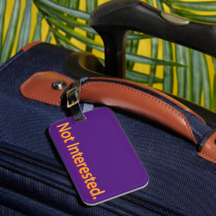 Étiquette À Bagage Pas Intéressé. Texte orange