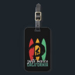 Étiquette À Bagage Père Noël Monica Beach California Retro Surfing<br><div class="desc">Design rétro vintage pour les surfeurs qui aiment surfer et surfer sur les vagues de l'océan. Vacances d'été cool, vacances de printemps marchandises pour ceux qui aiment le soleil chaud, le temps tropical, bronzage sous le palmier. Un design grandiose et déprimé à porter tout en profitant de la fête de...</div>