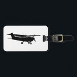 Étiquette À Bagage Vol noir classique de silhouette de Cessna<br><div class="desc">Un vol de silhouette de Cessna d'avions pour n'importe quel enthousiaste d'aviation, customisent ceci avec le texte et votre choix de couleur d'arrière - plan. Changez facilement la couleur de cet arrière - plan de conception du blanc de préréglage en n'importe quelle couleur de votre choix dans une étape. Cliquez...</div>