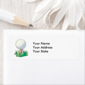 Étiquette balle de golf assise sur un terrain de golf (En situation)