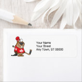 Étiquette bande dessinée ridicule du castor de hockey canadi (En situation)