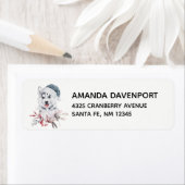 Étiquette Chien de Noël Husky dans un chapeau de Père Noël (En situation)