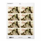 Étiquette Chiens jouant avec le mistletoe de Noël et la baie (Feuille entière)