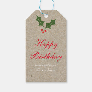 Étiquette de cadeau de Noël avec houx et baie