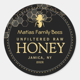 Étiquette de miel noir avec abeille stylisée et pe