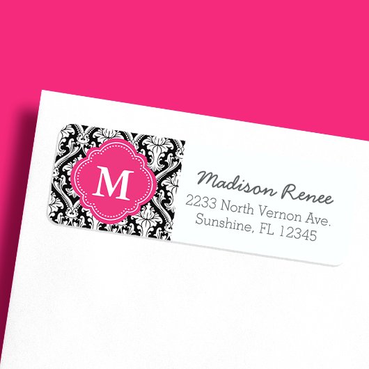 Étiquette de monogramme tendance noir et rose vif