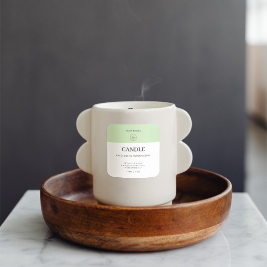 Étiquette de produit de bougie vert doux de logo m