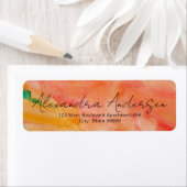 Étiquette de script moderne tendance aquarelle ora (En situation)